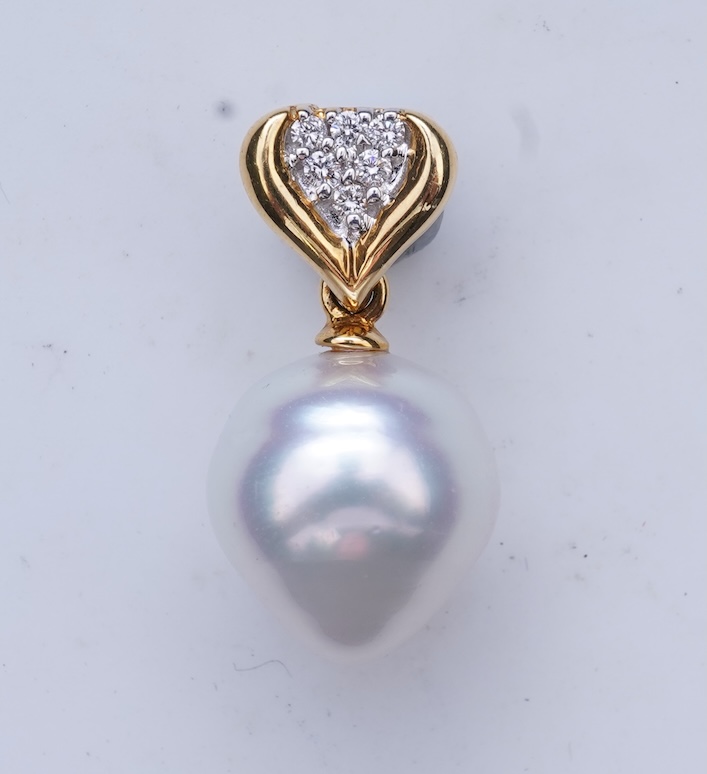 A cultured pearl and diamond pendant